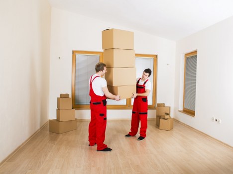 Bens Rubbish Removal professionals assessing furniture for pick-up